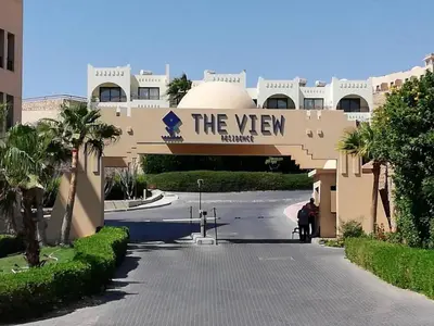 a building with a sign that reads the view at Bellevue The View in Hurghada