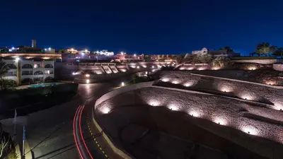 a city at night with street lights and buildings at Bellevue The View in Hurghada