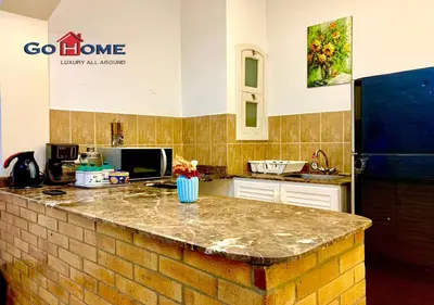a kitchen with a brick counter top in a kitchen at 1 Bed Room West Golf at El-Gouna Y12-0 in Hurghada