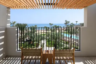 a dining room with a view of the ocean at Serry Beach Resort in Hurghada