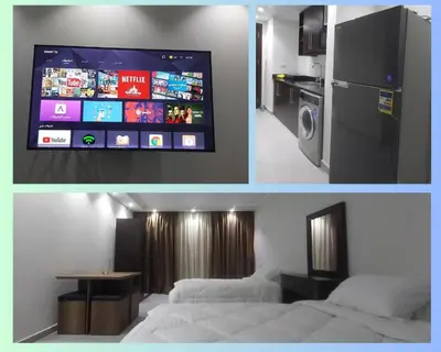two pictures of a room with a bed and a television at Scandic Resort: Comfy & Cozy. A433 in Hurghada