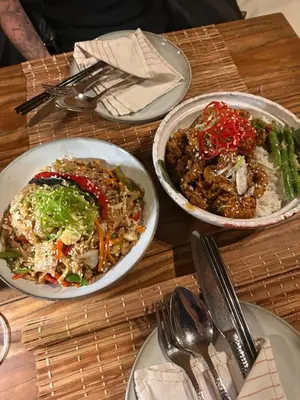 a table with three plates of food on it at 3BR 2BA Retreat with Four Pools Gym and Onsite Dining Close to El Gouna in Hurghada