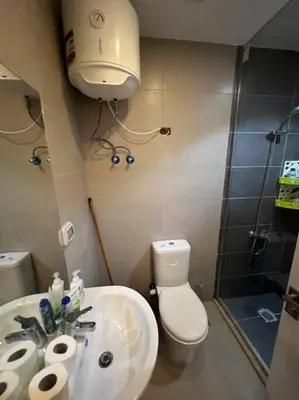 a bathroom with a toilet and a sink and a shower at Brand new studio at G-Cribs ElGouna in Hurghada