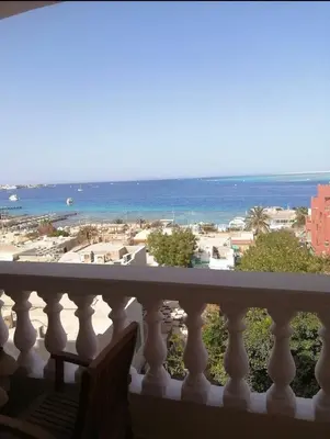 a balcony with a view of the ocean at LA prestigia in Safaga