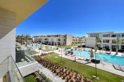 a view of the pool at a resort at Refreshed & Uplifted 2 BDR G Cribs in Hurghada