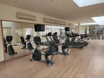 a gym with treadmills and elliptical machines at veranda sahl hasheesh resort studio in Hurghada