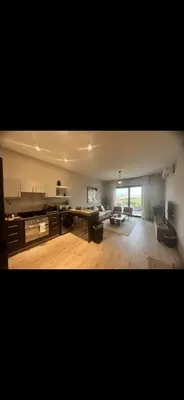 a large living room with a couch and a table at El Gouna 3 bedroom Penthouse Cyan in Hurghada