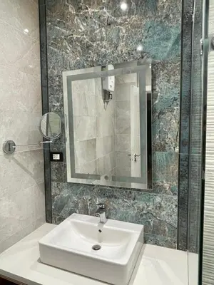 a bathroom with a sink and a mirror at Hurghada-Magawish Villa 1 in Hurghada
