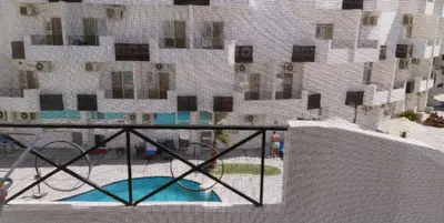 a view from a window of a building with a pool at منتجع طيبة فيو Tiba view in Hurghada