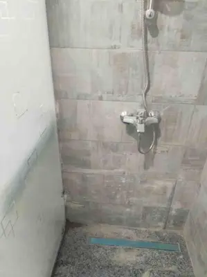 a bathroom with a sink and a shower at شاليه السعادة in Hurghada