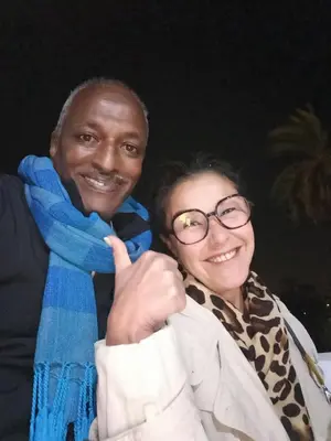 a man and a woman giving a thumbs up at ABU Nubian Guest House in Aswan