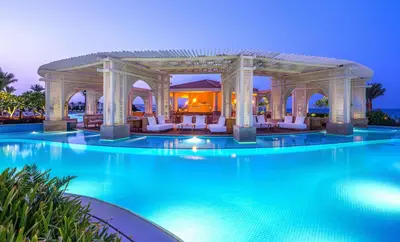 a pool at a resort with a gazebo at Baron Palace Sahl Hasheesh in Hurghada