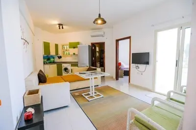 a living room with a couch and a table at La bonita compound for rent in Hurghada