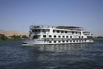 a large white boat floating on the water at Iberotel Amara Nile Cruise - Every Thursday from Luxor for 07 & 04 Nights - Every Monday From Aswan for 03 Nights in Luxor