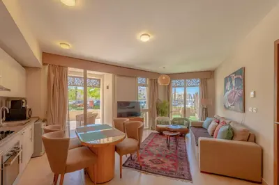 a living room with a couch and a table at Fresh & Modern 1BR in El Gouna. Mangroovy Pool & Beach in Hurghada