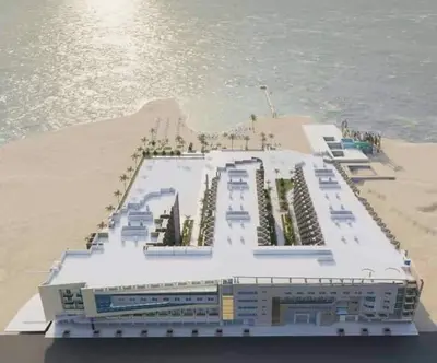 a large cruise ship sitting on the beach at Scandic resort 547 in Hurghada