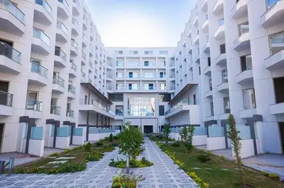 a rendering of an apartment building with a courtyard at Scandic resort 547 in Hurghada