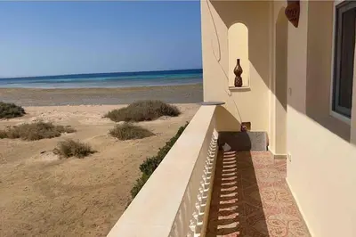 a house with a staircase leading to the beach at Sunshine villa ( south Safaga ) in Safaga