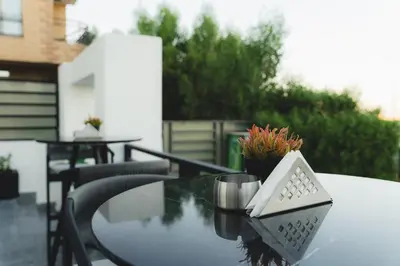a table with a plant on top of it at SOLA INN Hotel Hurghada in Hurghada