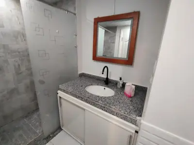 a bathroom with a sink and a mirror at Scandic Resort Hurghada in Hurghada