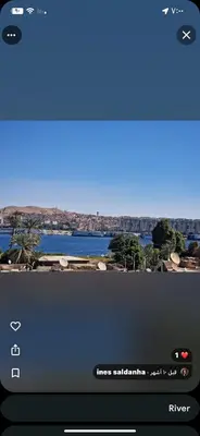 a television screen with a view of a city at Nuba Heart in Aswan