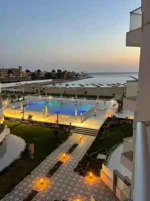 an aerial view of a resort with a beach at scandic resort in Hurghada