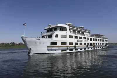 a large white boat floating on the water at Iberotel Helio Nile Cruise - Every Monday from Luxor for 07 & 04 Nights - Every Friday From Aswan for 03 Nights in Luxor