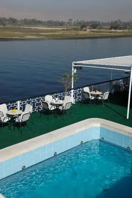 a swimming pool on the deck of a boat at Iberotel Helio Nile Cruise - Every Monday from Luxor for 07 & 04 Nights - Every Friday From Aswan for 03 Nights in Luxor