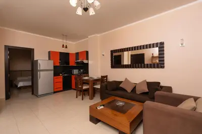 a living room with a couch and a table at one bedroom apartment in Hurghada