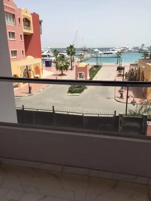 a view of a courtyard from a balcony of a building at Hurghada Marina in Hurghada