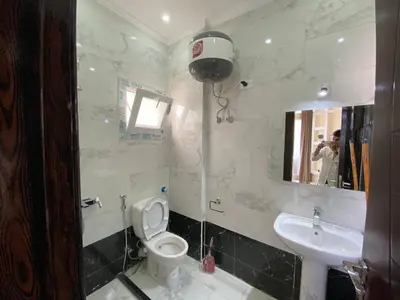 a bathroom with a toilet and a sink at ديزرت بيرل in Hurghada