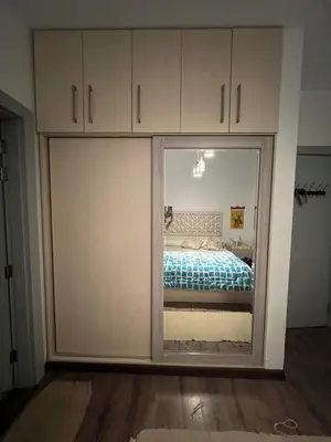 a bedroom with a sliding door with a bed at 1BR with private Heated Jacuzzi at Sholan Elgouna in Hurghada