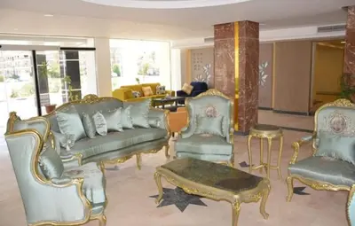 a living room with a couch and chairs at Fanadir Bay Resort in Hurghada, Egypt in Hurghada