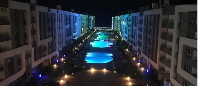 an overhead view of a swimming pool at night at Fanadir Bay Resort in Hurghada, Egypt in Hurghada