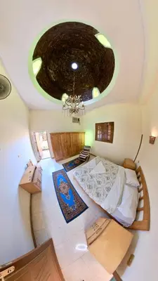 an overhead view of a bedroom with a large bed at Sunset Haven Guesthouse in Luxor
