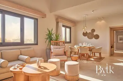 a living room with a couch and a table at BYTK - Casa Del Mar in Hurghada