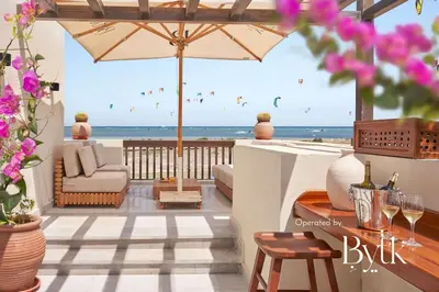 a patio with a view of the ocean at BYTK - Casa Del Mar in Hurghada