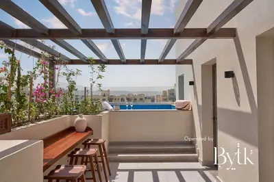 a balcony with a view of a swimming pool at BYTK - Casa Del Mar in Hurghada