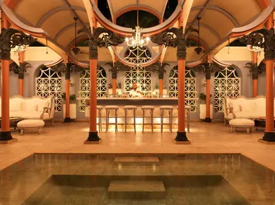 a lobby with a bar in the middle of a room at La Maison Bleue El Gouna in Hurghada