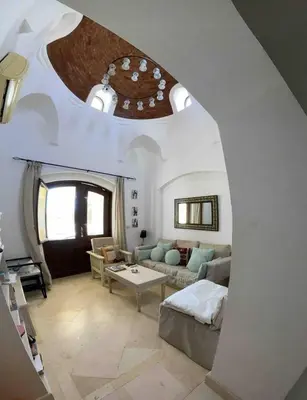 a living room with a couch and a table at Spacious Villa with private pool-Gouna in Hurghada