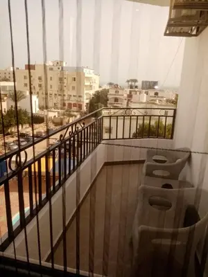 a balcony with a view of a city at A216 flat Al Makramia in Hurghada