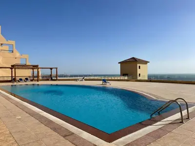 a swimming pool on top of a building at apartment 2 bedrooms in the view in Hurghada