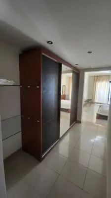 an empty room with a closet and a bedroom at apartment 2 bedrooms in the view in Hurghada