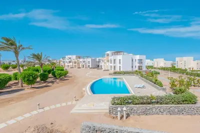 an aerial view of a resort with a swimming pool at Cozy 2BR in Cyan, El Gouna Swiming Pool Access in Hurghada