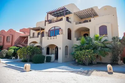 a large house on the beach in front at Style Apartment in nubian design at lagoon in Hurghada