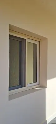 a window on top of a white wall at Hurghada Cosy Apart in Hurghada