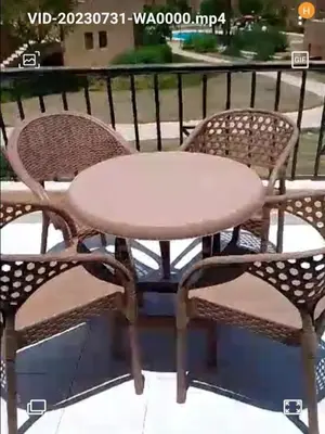 two wicker chairs and a table on a patio at Шале Stella di mare Makadi Хургада in Hurghada