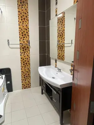 a bathroom with a sink and a mirror at Hurghada-Magawish Villa 4 in Hurghada