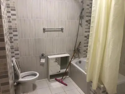 a bathroom with a toilet and a sink and a shower at Hurghada-Magawish Villa 4 in Hurghada