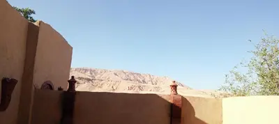 a building with a mountain in the background at Mountain View House in ‘Ezbet Abu Ḥabashi